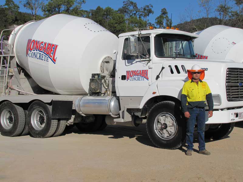 Concrete Plant Manager, Peter Green (Greeny), alongside one of our Concrete trucks